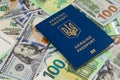 ukrainian passport and 100 euro and 100 dollars banknotes background