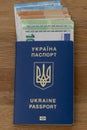 Ukrainian passport, soldier identification badge, euro banknotes. Concept: corruption in Ukraine, evasion of mobilization