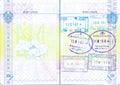 Passport with stamps of Kyrgyzstan, Kazakhstan and Uzbekistan Royalty Free Stock Photo