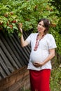 Ukrainian pregnant woman in traditional embroidered shirt Royalty Free Stock Photo