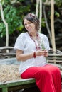 Ukrainian pregnant woman in traditional embroidered shirt