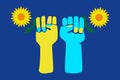 Ukrainian raised fists holding Sunflowers