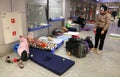 Ukrainian refugees camp out in the halls and corridors of railway station in Cracow, Poland