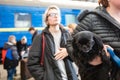 Ukrainian refugees from Mariupol on Lviv railway station waiting for train to escape to Europe Royalty Free Stock Photo