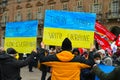 Ukrainian refugees participate in the European public protest against the Russian military invasion