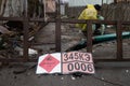 Ukrainian reservist soldier checks a construction looking for mines