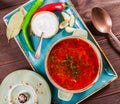 Ukrainian and Russian traditional beetroot soup - borscht in bowl with sour cream, Royalty Free Stock Photo