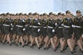 Ukrainian servicewomen march during a final rehearsal for the Independence Day military parade in central Kyiv, Ukraine