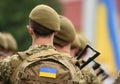 Ukrainian soldier. Ukrainian in army. Ukrainian flag on military uniform. Troops of Ukraine