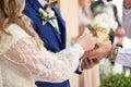Ukrainian tradition at the wedding to break bread, brides stand with bread in their hands. Royalty Free Stock Photo