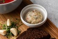 Ukrainian traditional borsch. Beetroot and cabbage soup with meat. Served on wooden plate with rye bread, sour cream Royalty Free Stock Photo