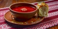 Ukrainian traditional borsch. Russian vegetarian red soup in a ceramic bowl on rustic wooden table background Royalty Free Stock Photo