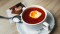 Ukrainian traditional borsch. Russian vegetarian red soup in white bowl on red wooden background. Top view. Borscht, borshch with Royalty Free Stock Photo