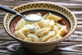 Ukrainian traditional lazy dumplings with cottage cheese. Ukrainian Cuisine. Homemade vareniki in a bowl, delicious lunch.