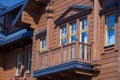 Ukrainian traditional rural wooden house, background exterior facade with windows frame and balcony. Kyiv, Ukraine Royalty Free Stock Photo