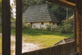 Ukrainian village rustic country side clay house yard from frame work wooden porch foreground outside Royalty Free Stock Photo