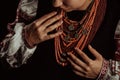 Ukrainian woman in legacy ancient coral beads, Zgarda. Authentic traditional. Royalty Free Stock Photo