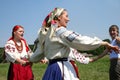 Ukrainian woman in national costume dance in a circle