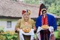 Ukrainians - man and woman, greeted guests with bread and salt