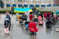 Anti war protest with empty strollers, baby carriages and toys representing children killed during Russia war in Ukraine