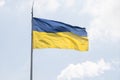 ukranian flag on a pole over beautiful sky Royalty Free Stock Photo