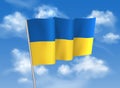 Ukranian flag in the wind on cloudy blue sky background