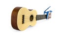 Ukulele and Capo isolated on white Clipping path included : does not include shadow.