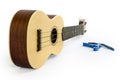 Ukulele and Capo isolated on white Clipping path included : does not include shadow.