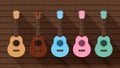 Ukulele cute collection on the wood wall, small ukelele pastel color for flat icon, realistic ukelele set for classical music play