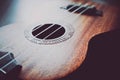 Ukulele guitar macro view, strings close up. Photo depicts music Royalty Free Stock Photo