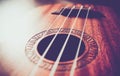 Ukulele guitar macro view, strings close up. Photo depicts music Royalty Free Stock Photo