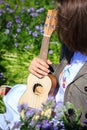 Ukulele music instrument in female hand Royalty Free Stock Photo