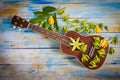 Ukulele with Ylang-ylang flower and leaf