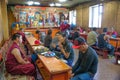 Ulaanbaatar/Mongolia-12.08.2016:The buddhist ceremony inside the temple in Ulaanbaatar. People sitting and praying
