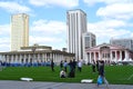 Ulaanbaatar, Mongolia - 11 May 2022: young Mongolian people rest and communicate with each other on a football field in the centre