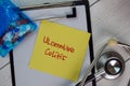 Ulcerative Colitis write on sticky notes isolated on Wooden Table