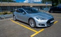 Silver 2015 Tesla Model S electric car on a parking lot.. Royalty Free Stock Photo