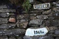 Ulleri name guide post arrow sign on the way at Ulleri village Nepal - Travel Hiking and Trekking concept Royalty Free Stock Photo