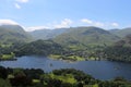 Ullswater and Glenridding with mountains behind Royalty Free Stock Photo