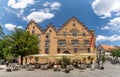 The historic town hall building in the city center of Ulm with many people enjoying a day out Royalty Free Stock Photo