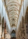 View of the center aisle and choir and pulpit in the minster of Ulm