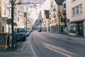 Empty Streets of Ulm: Serene Urban Landscape with Houses, Trees, and Parked Cars on a Sunny Day