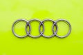 Ulm, Germany - March, 29, 2015: Audi logo on a bright green classic car hood. Royalty Free Stock Photo