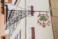 Rustic Charm and Timeless Craftsmanship: A Wrought Iron Sign on a Fachwerk House in Ulm\'s Old Town