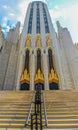 Ulsa USA Boston Avenue Methodist Church - Art Deco Building towers into sky with gold figureson facade and around