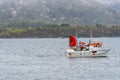 Small fishing vessel inside the Norwegian fjord Royalty Free Stock Photo