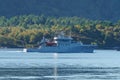 Grey norwegian coastguard with no name in the fjord