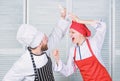 Ultimate cooking challenge. Culinary battle of two chefs. Couple compete in culinary arts. Kitchen rules. Who cook Royalty Free Stock Photo