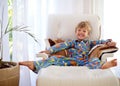 Ultimate relaxation. Portrait of an adorable little boy relaxing on the couch at home. Royalty Free Stock Photo