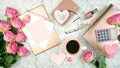 Ultra feminine pink desk workspace with rose gold accessories flatlay.